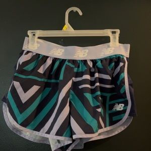New balance athletic shorts with built in liners! Worn a few times!